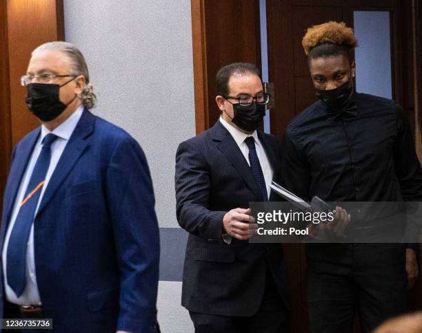 Former Las Vegas Raiders player Henry Ruggs III appears in court with his attorneys David Chesnoff and Richard Schonfeld at the Regional Justice...