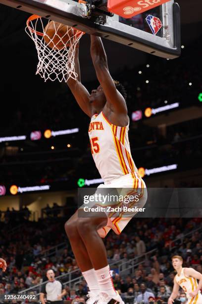 Clint Capela of the Atlanta Hawks dunks the ball during the game against the Oklahoma City Thunder on November 22, 2021 at State Farm Arena in...