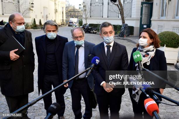 France's Interior Minister Gerald Darmanin , flanked by France's Junior Minister for Sports Roxana Maracineanu , France's Justice Minister Eric...