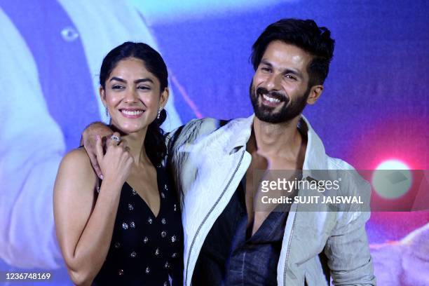 Bollywood actors Shahid Kapoor and Mrunal Thakur poses for a picture during the trailer launch of their upcoming Hindi film Jersey written and...