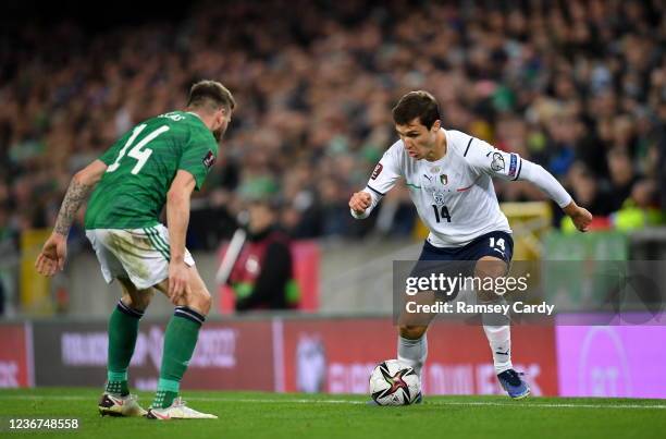 Antrim , United Kingdom - 15 November 2021; Federico Chiesa of Italy and Stuart Dallas of Northern Ireland during the FIFA World Cup 2022 Qualifier...