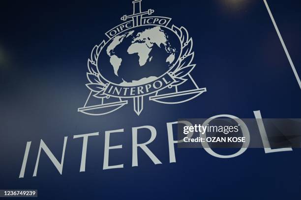 This picture taken on November 23 shows the logo of Interpol during the 89th Interpol General Assembly in Istanbul. - On November 25 the delegates...