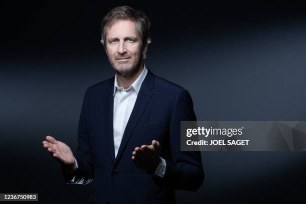 French Musee du Louvre's bord of directors' member and co-founder of the Webhelp Group Frederic Jousset poses during a photo session in Paris on...