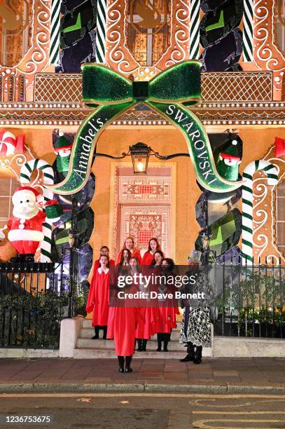 Children's choir sing carols at the Annabel's x Swarovski Holiday façade unveiling at Annabels on November 23, 2021 in London, England.