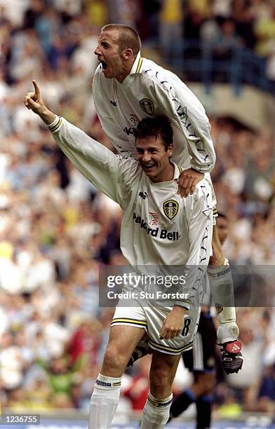 Michael Bridges and Lee Bowyer of Leeds celebrate during the FA Carling Premiership match against Newcastle played at Elland Road in Leeds, England....