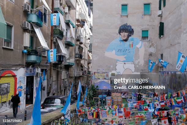 General view shows a mural painting of late Argentinian football legend Diego Maradona at the so-called "Maradona square" in the Quartieri Spagnoli...