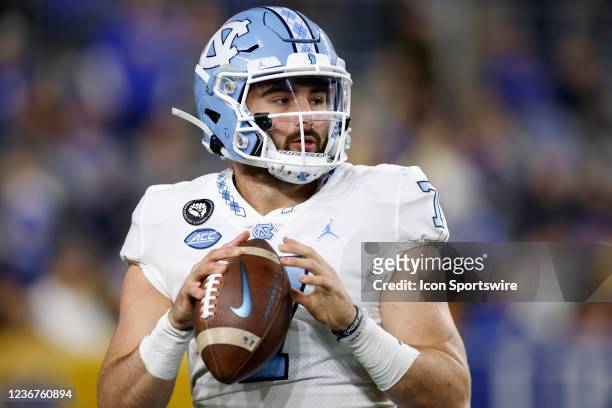 North Carolina Tar Heels quarterback Sam Howell warms up on the sideline during a college football game against the Pittsburgh Panthers on Nov. 11,...