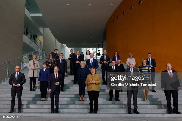 Acting Chancellor Angela Merkel poses with members of her Cabinet after her last cabinet meeting on November 24, 2021 in Berlin, Germany. Germany is...