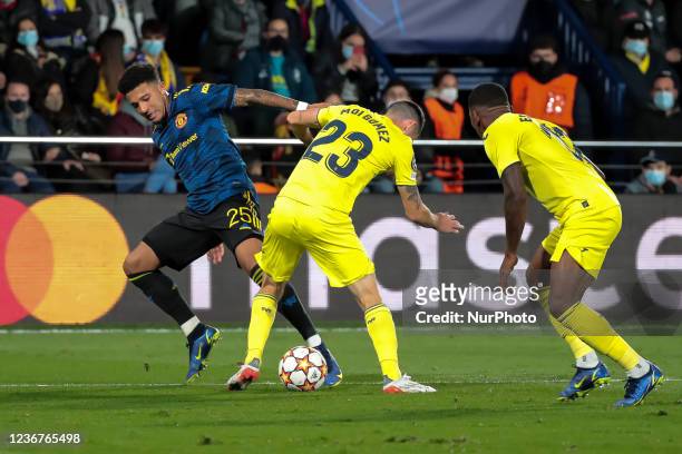 Forward of Manchester United Jadon Sancho in action against Villarreal's Moises Gomez Bordonado during Champions League match between Villarreal CF...