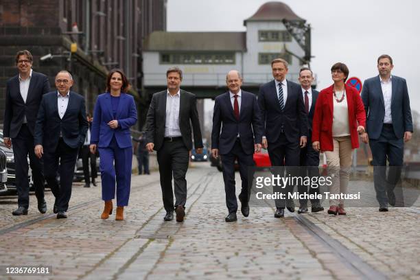 Norbert Walter-Borjans and Saskia Esken , co-leaders of the German Social Democrats , Olaf Scholz , SPD member and likely next German chancellor,...