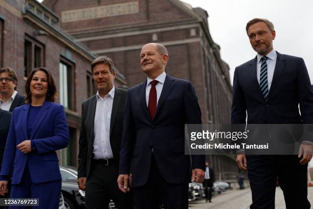 Christian Lindner, leader of the German Free Democrats , Olaf Scholz, SPD member and likely next German chancellor, Annalene Baerbock and Robert...