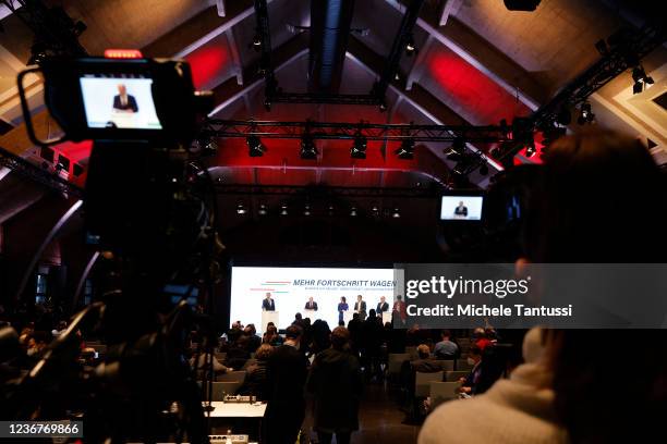 Olaf Christian Lindner, leader of the German Free Democrats , Olaf Scholz, SPD member and likely next German chancellor, Annalene Baerbock and Robert...