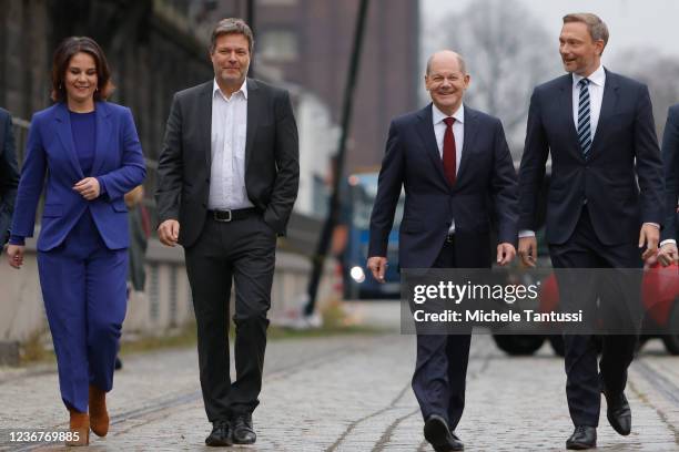 Christian Lindner, leader of the German Free Democrats , Olaf Scholz, SPD member and likely next German chancellor, Annalene Baerbock and Robert...