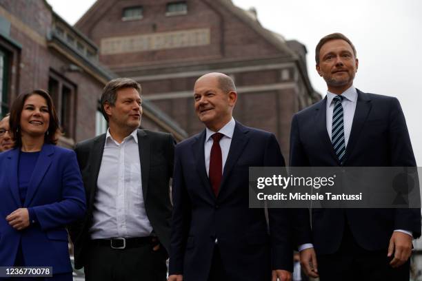 Christian Lindner, leader of the German Free Democrats , Olaf Scholz, SPD member and likely next German chancellor, Annalene Baerbock and Robert...