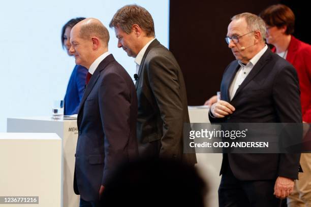 Social Democrats candidate for Chancellor Olaf Scholz, the co-leaders of Germany's Greens party Annalena Baerbock and Robert Habeck, Social...