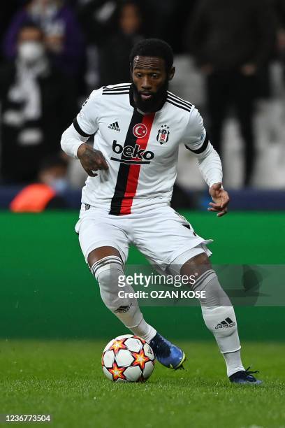 Besiktas' French midfielder Georges-Kevin Nkoudou drives the ball during the UEFA Champions League group C football match between Besiktas JK and AFC...