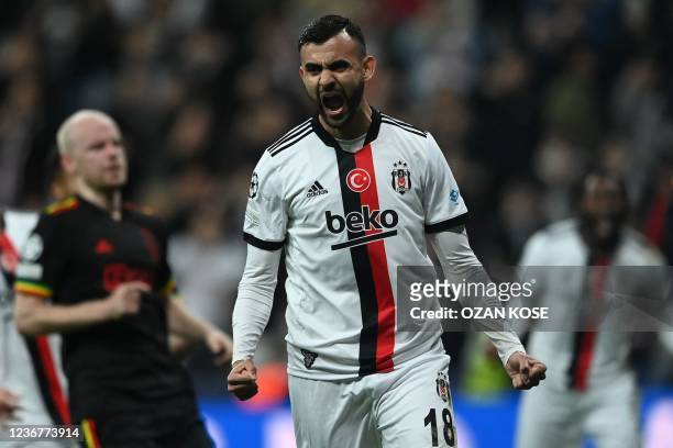 Besiktas' Algerian midfielder Rachid Ghezzal celebrates after scoring his team's first goal on a penalty during the UEFA Champions League group C...