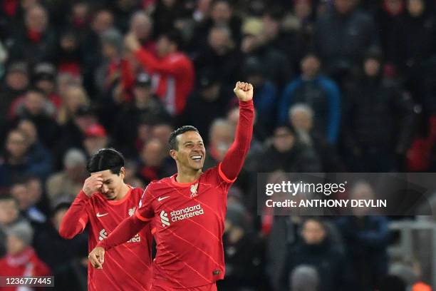 Liverpool's Spanish midfielder Thiago Alcantara celebrates scoring his team's first goal during the UEFA Champions League group B football match...