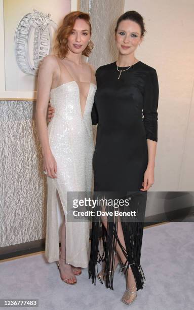 Eleanor Tomlinson and Caitriona Balfe attend the De Beers Jewellers London Flagship Store opening event on November 24, 2021 in London, England.