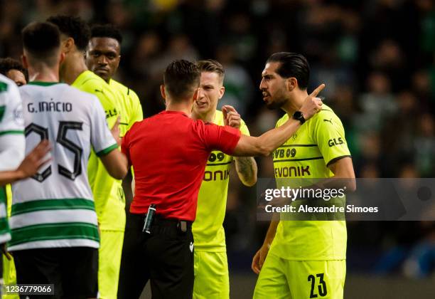 Emre Can of Borussia Dortmund receives the red card during the Champions League Group C match between Sporting CP and Borussia Dortmund at the...