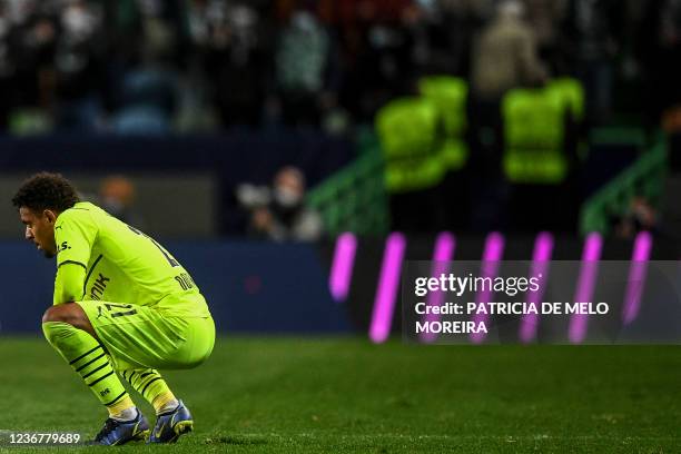 Dortmund's Dutch forward Donyell Malen reacts at the end of the UEFA Champions League first round Group C football match between Sporting CP and...
