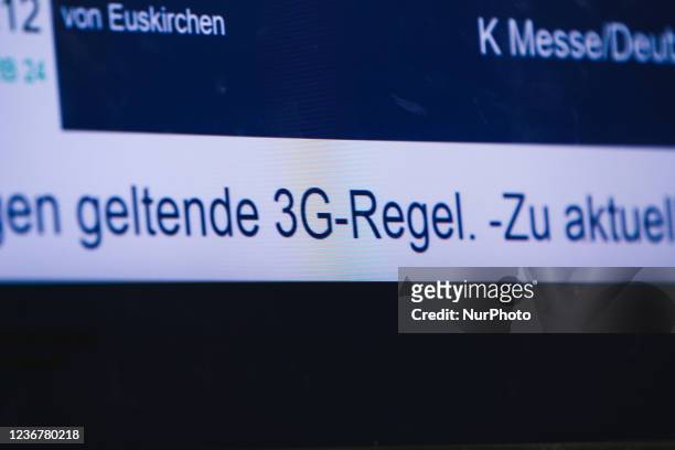 Train information screen displays 3G rule applies from today using trains at cologne central station in Cologne, Germany on Nov 24, 2021