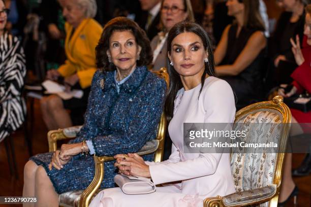 Queen Letizia of Spain and Queen Silvia of Sweden arrive at the Bernadotte Library during an official state visit at the Stockholm Palace on November...