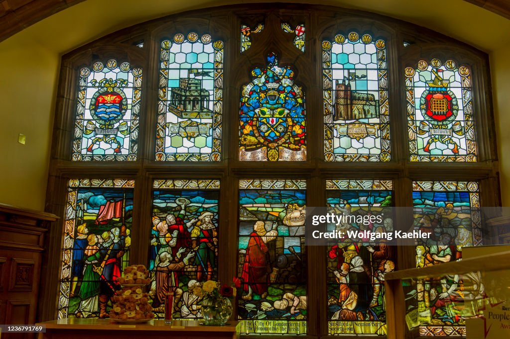 Detail of the stained-glass windows of the city hall (the...