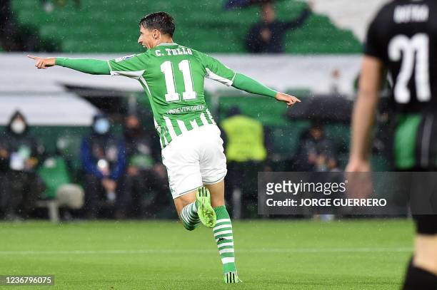 Real Betis' Spanish midfielder Cristian Tello celebrates scoring the opening goal during the UEFA Europa League first round group G football match...
