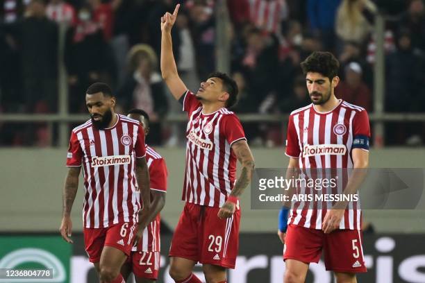 Olympiacos' Portuguese forward Tiquinho Soares celebrates after scoring his team's first goal during the UEFA Europa League group D football match...