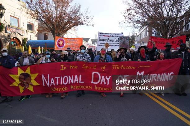 People march during the National Day of Mourning, on Thanksgiving day, November 25, 2021 in Plymouth, Massachusetts. - In the fall of 1621, a handful...