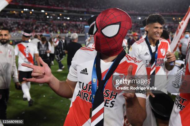 Julian Alvarez of River Plate celebrates winning the championship wearing a Spiderman mask after a match between River Plate and Racing Club as part...