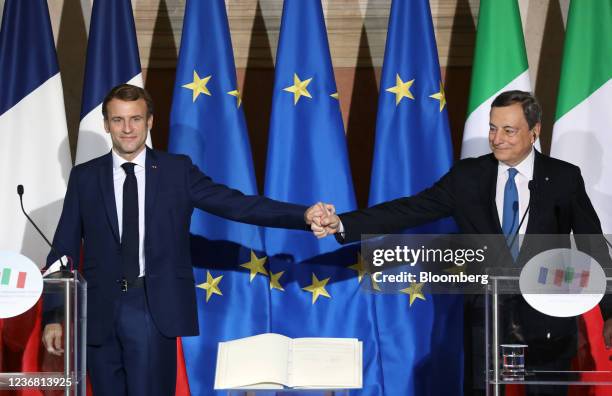 Mario Draghi, Italy's prime minister, right, and Emmanuel Macron, France's president, attend a news conference at Villa Madama in Rome, Italy, on...