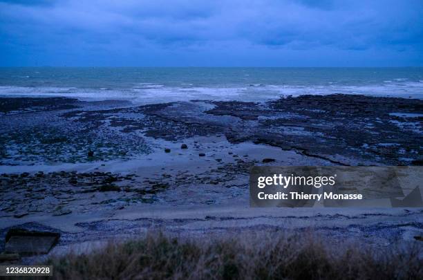 Wimmereux beach is seen at dawn on November 26, 2021 in Wimmereux, Pas-de-Calais, France. After the boat accident in the English Channel which...