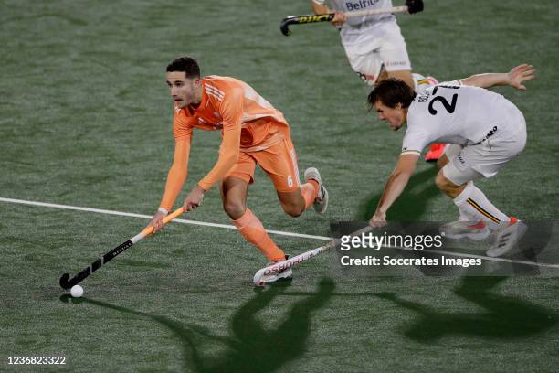 Jonas de Geus of Holland, Tom Boon of Belgium during the Pro League match between Holland v Belgium at the Wagener Stadion on November 26, 2021 in...