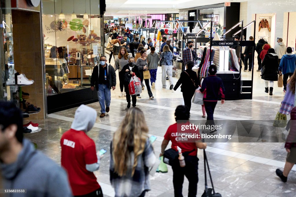 Shoppers walk through the Westfield Garden State Plaza mall on