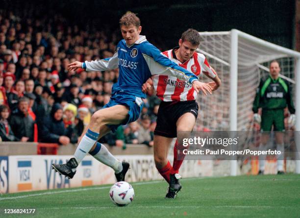 Tore Andre Flo of Chelsea attempts to hold off the challenge from James Beattie of Southampton during an FA Carling Premiership match at The Dell on...