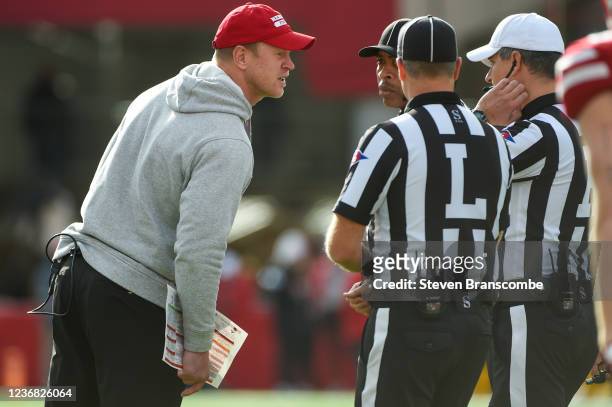 Head coach Scott Frost of the Nebraska Cornhuskers talks to the officials in the first half at Memorial Stadium on November 26, 2021 in Lincoln,...