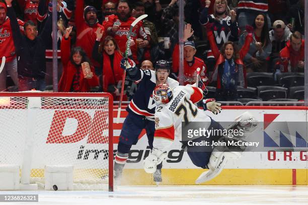 Tom Wilson of the Washington Capitals celebrates a goal after he collides with Sergei Bobrovsky of the Florida Panthers in the. Seconds period during...