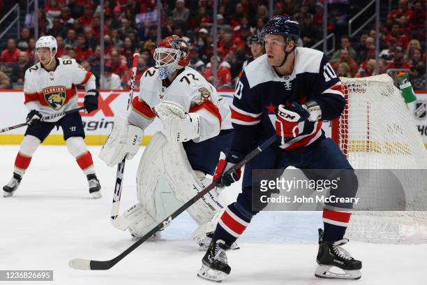 Daniel Sprong of the Washington Capitals posts up in front of Sergei Bobrovsky of the Florida Panthers during a game at Capital One Arena on November...