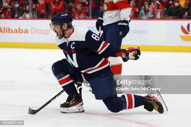 Alex Ovechkin of the Washington Capitals celebrates a hat-trick goal during a game against the Florida Panthers at Capital One Arena on November 26,...