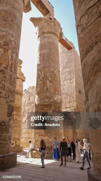View of Karnak Temple as tourists visit in Luxor, Egypt on November 27, 2021. The temple complex is the source for ancient Egyptian history and...