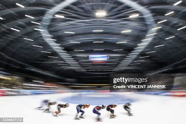 Skaters leading the way in the semi-final of the 1500 meters at the semifinal of the 1500 meters at the ISU World Cup Short Track Speed Skating in...