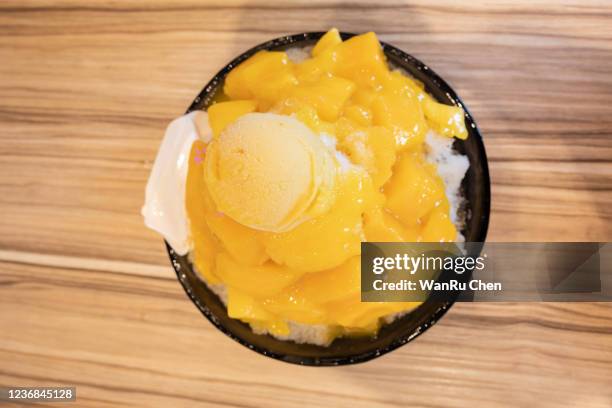 mango milk shaved ice - mango shaved ice stock pictures, royalty-free photos & images