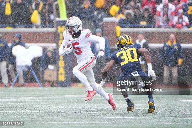 Ohio State Buckeyes wide receiver Garrett Wilson runs inside with a reception during The Michigan Wolverines vs the Ohio State Buckeyes game on...