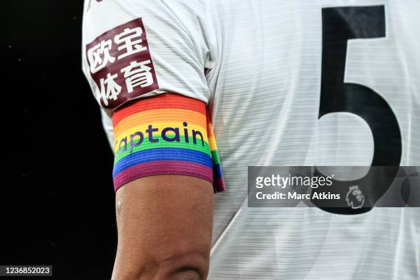 Rainbow armband is seen worn by Tyrone Mings of Aston Villa as clubs show their support to the Stonewall Rainbow Laces campaign during the Premier...