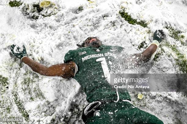 Jayden Reed of the Michigan State Spartans celebrates the Michigan State Spartans win against Penn State Nittany Lions at Spartan Stadium on November...