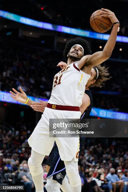 Jarrett Allen of the Cleveland Cavaliers grabs a rebound against Robin Lopez#33 of the Orlando Magic during the second half at Rocket Mortgage...