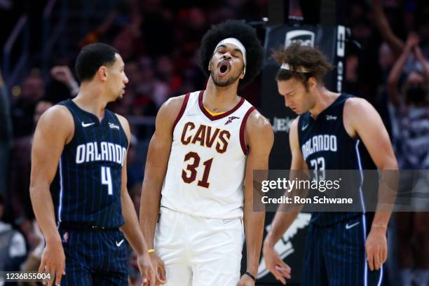 Jarrett Allen of the Cleveland Cavaliers celebrates after a dunk against the Orlando Magic during the second half at Rocket Mortgage Fieldhouse on...