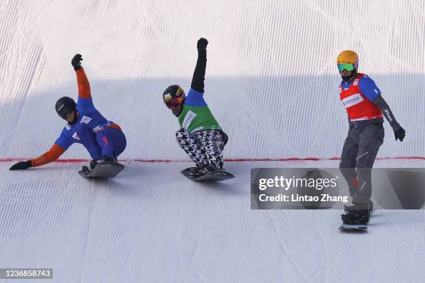 Jakob Dusek of Austria celebrates after crossing the finish line ahead of Glenn de Blois of the Netherlands and Nick Baumgartner of the United States...